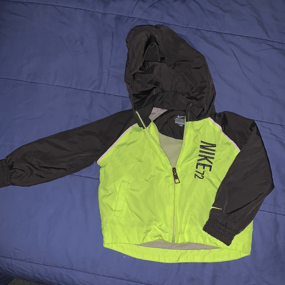 Neon green and dark grey Nike windbreaker.